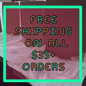 May include: A series of open cardboard shipping boxes lined with pink tissue paper and clear bubble wrap. The image features the text FREE SHIPPING ON ALL $35+ ORDERS in a stylized font with green outlines and orange fill against the boxes.