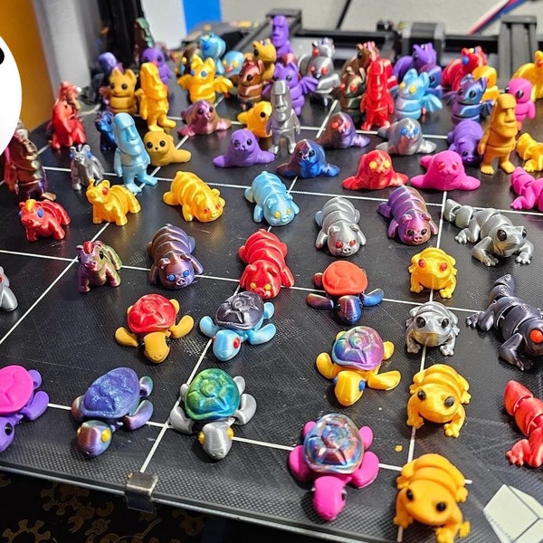 3d printed Tiny Articulated creatures designed by ZOU3D box of random minis