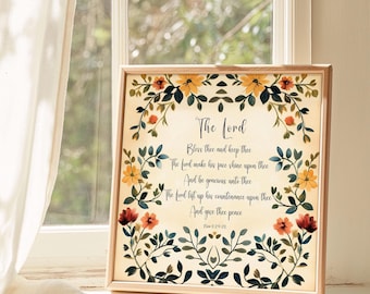 May include: A framed print with a floral border and a vintage-style background. The print features a bible verse from Psalm 29:20, "The Lord bless thee and keep thee; the Lord make his face shine upon thee, and be gracious unto thee: the Lord lift up his countenance upon thee, and give thee peace."