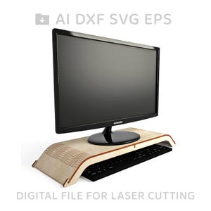 Puede incluir: Un soporte de monitor de madera con un diseño curvo y un teclado negro. El soporte está hecho para corte por láser y está diseñado para elevar un monitor de computadora y proporcionar espacio para un teclado.