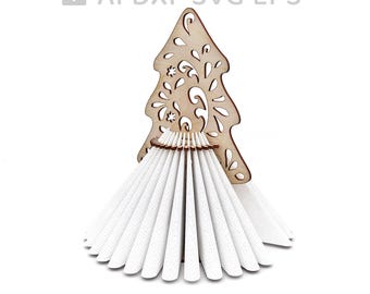 May include: A wooden Christmas tree napkin holder with a decorative design. The holder is made for laser cutting and is designed to hold napkins in a fan shape.