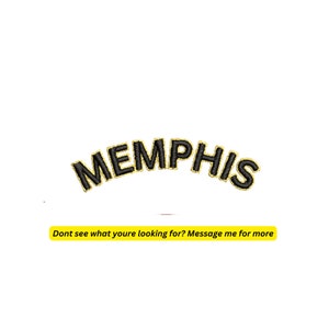 May include: Black embroidered patch with the word "MEMPHIS" in gold outline.