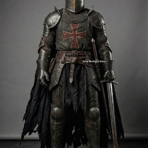 May include: Full suit of medieval armor, including a helmet, chainmail, and plate armor. The chest features a red cross on a dark background. A long sword is held at the side. The armor is dark gray with gold accents.