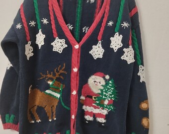 Beautiful ugly Christmas sweater.With lots of colorful knitted figures.PBJ Sport,brand. Size large.