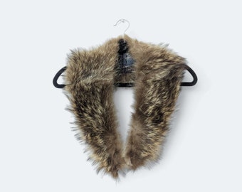 Real racoon fur collar/scarf. Good for a party or formal event.