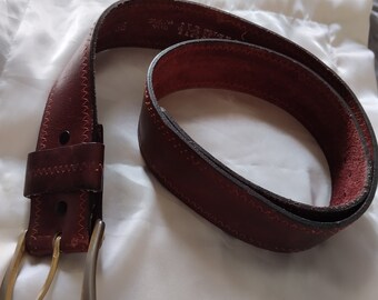 Wine colored leather belt,size 36.Harvard brand.2" wide.Gold tone metal buckle.