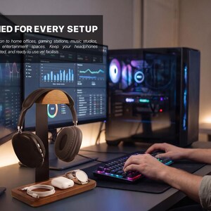 May include: A wooden and black metal headphone stand featuring a curved top rest, a vertical support post, and a rectangular base with integrated storage slots for a charging cable, wireless earbuds case, and a wristwatch.