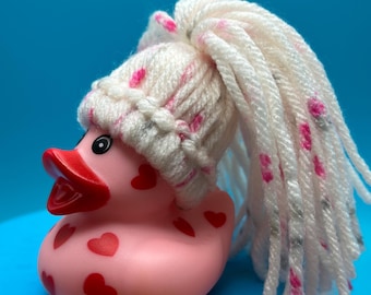 Valentine  rubber ducks with hearts all over the body, handmade hair of yarn. Unique and one of a kind. Sold seperate