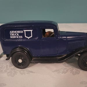 Vintage 1932 Replica Armored Truck Services Ford Coin Bank by The ERTL Co.
