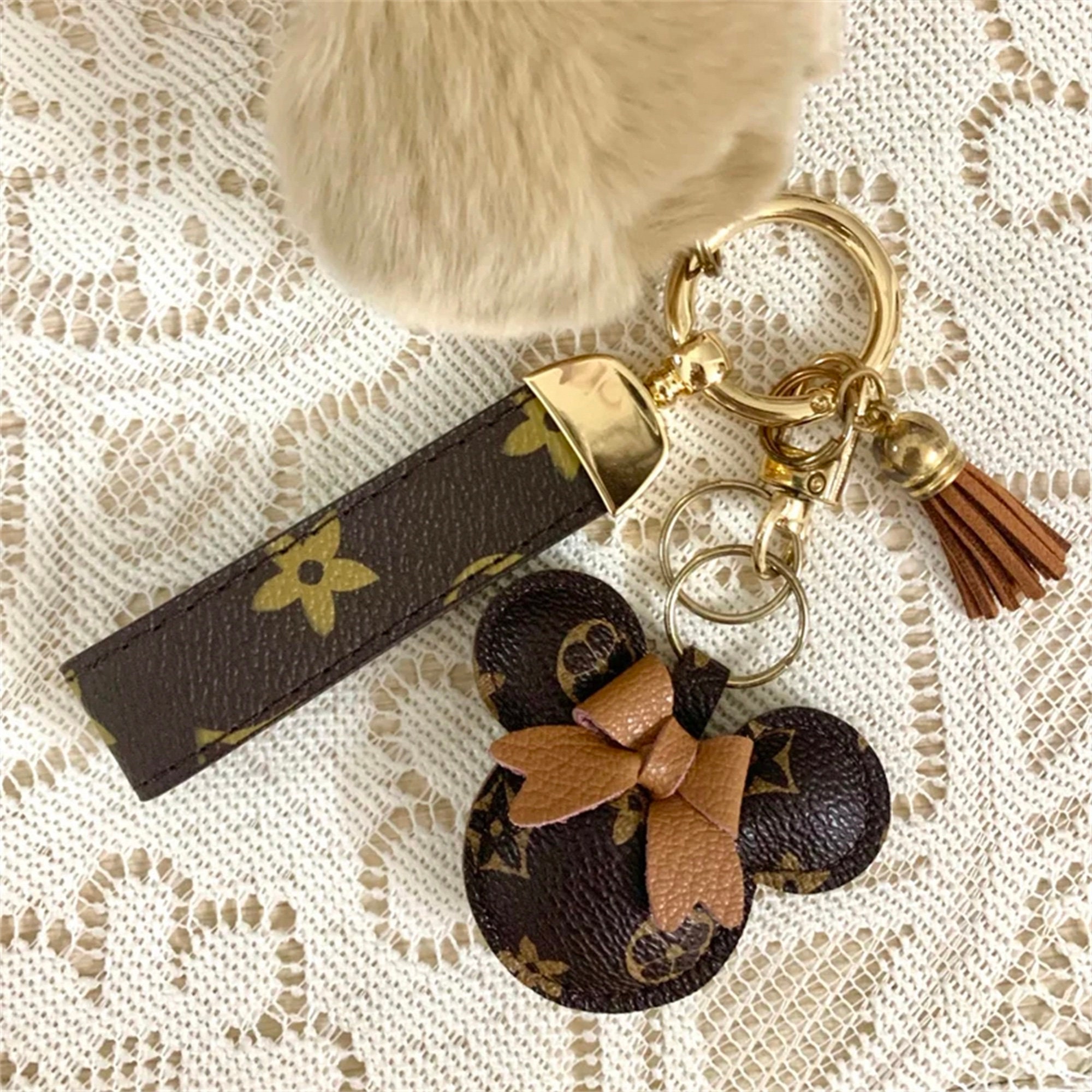 K&Co - Louis Vuitton accessories, bag pendant in the shape of a small dog  with the Mono