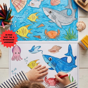 May include: A children's workbook with colorful illustrations of sea creatures, including sharks, fish, and crabs. The workbook features the text "30-PAGE 'SPOT THE 4-DIFFERENCES' WORKBOOK!" A child is shown coloring the illustrations with a red crayon.