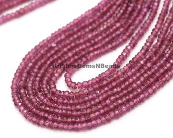 May include: Close-up of multiple strands of small, round, faceted, deep pink beads. The beads are strung together, creating a layered effect. The beads are a consistent size and color, with a slight sparkle. The text "KrishnaGemsNBeads" is visible.