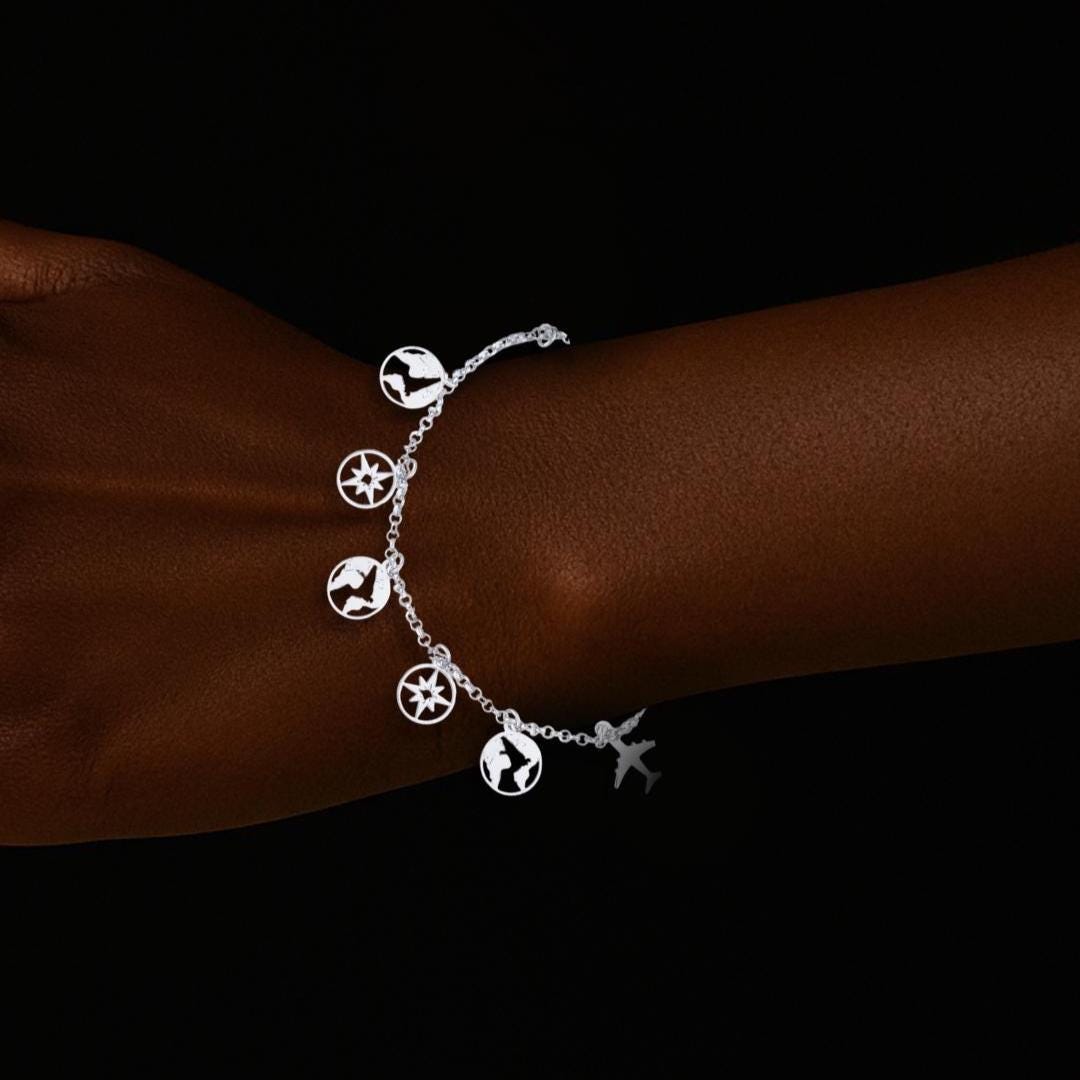 Platinum Plated Sterling Silver Charm Bracelet: Airplane, Compass