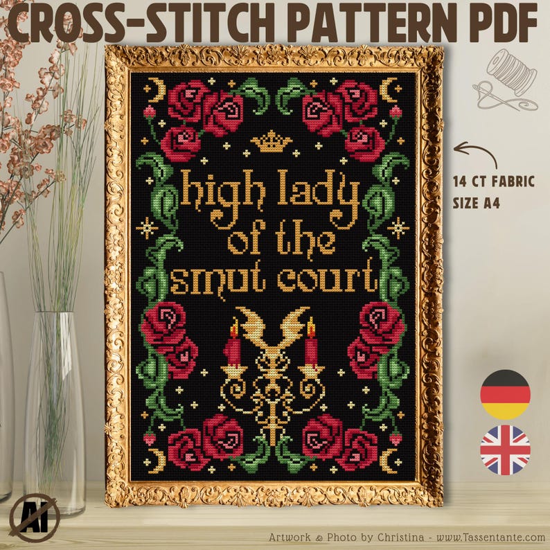May include: A framed cross-stitch pattern with the text "high lady of the smut court" in gold lettering. The design features red roses, green vines, and a gold candelabra on a black background. The frame is gold.