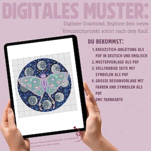 May include: A digital cross-stitch pattern displayed on a tablet. The design features a butterfly with a celestial background. The text on the screen reads "DIGITALES MUSTER" and "DU BEKOMMST:" with a list of what is included.