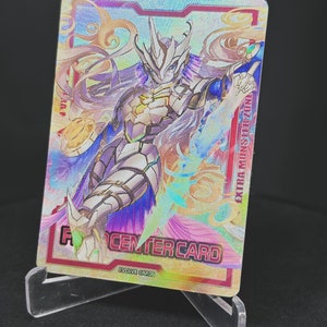 May include: A holographic trading card featuring a white and purple character with a sword and a golden crown. The card is labeled "Evolve Card" and "Center Card".