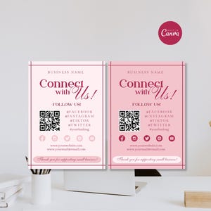 May include: Two rectangular business signs in light and dark pink featuring the text Connect with Us!, Follow Us!, social media icons, a QR code, and placeholders for website and email addresses, with a Thank you for supporting small business footer.