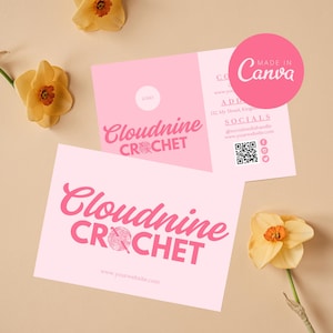 May include: Pink business card with the text "Cloudnine Crochet" and a stylized image of a crochet hook and yarn ball. The website address "www.yourwebsite.com" is printed below the logo. The back of the card has contact information, social media handles, and a QR code.