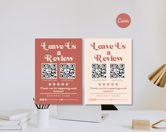 Puede incluir: Dos carteles rectangulares con el texto Leave Us a Review, dos códigos QR etiquetados como Facebook y Google, cinco estrellas y el texto Thank you for supporting small business! y BUSINESS NAME. Un cartel es terracota y el otro es crema.