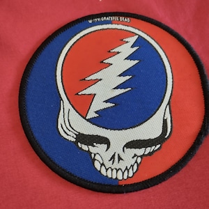 May include: A set of three ceramic mugs with a speckled, matte finish. The mugs are in cream, light brown, and dark brown. Each mug has a simple, minimalist design, ideal for coffee or tea.