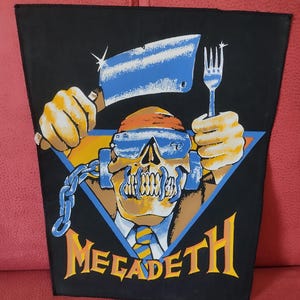Megadeth vintage 80S backpatch iron on print, for true collectors of the relic items of big thrash metal band Megadeth. Vic Rattlehead RAR