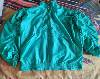 Chaqueta de gimnasia Fila vintage de los años 90, hecha en Italia, con lacci sulle maniche, colore verde acqua lucido. Talla S, ver dimensiones en la descripción, FILA