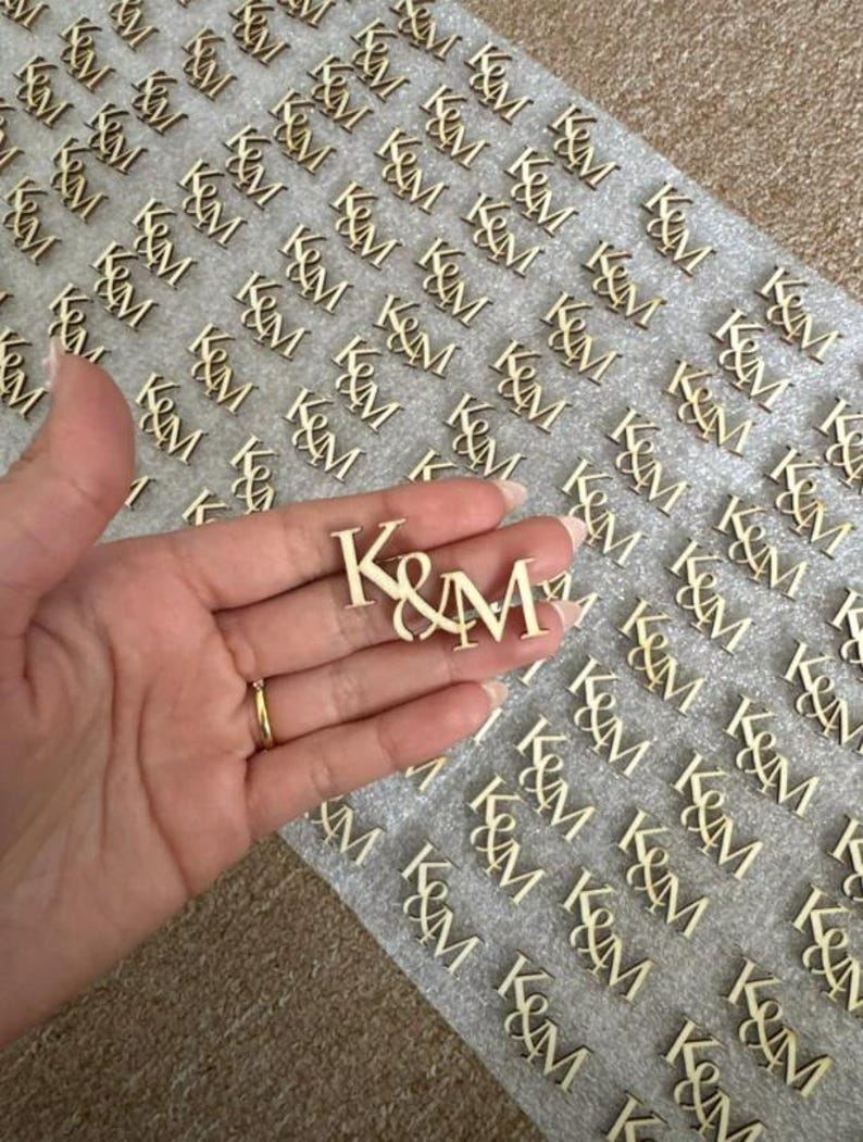 "Engraved acrylic drink tags for wedding, customizable initials for wine glasses."