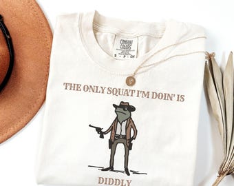 Camiseta "La única sentadilla que hago es Diddly", divertida camiseta de rana vaquera, regalo con humor del oeste, camiseta para gimnasio, western sarcástico, camiseta "Diddly Squat"