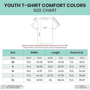 May include: A Youth T-Shirt Comfort Colors size chart featuring a line drawing of a t-shirt with labeled width, length, and sleeve measurements. A table provides sizing data for XS to XL in both inches and centimeters, noting a 1-3cm margin of error.