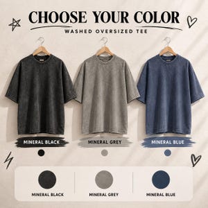 May include: Three washed oversized tees in black, grey, and blue, hanging on wooden hangers. The text "CHOOSE YOUR COLOR" and "WASHED OVERSIZED TEE" are displayed above the shirts. Below are color swatches labeled "MINERAL BLACK", "MINERAL GREY", and "MINERAL BLUE".