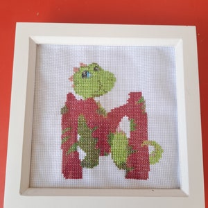 Hand made cross stitch letters