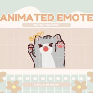 May include: Animated emote graphic featuring a gray cat with pink paws and a red nose, saying "Boo!!". The background is a light peach color with a grid pattern and decorative flowers. The text "ANIMATED EMOTE" is at the top.
