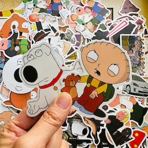 May include: A collection of colourful cartoon stickers featuring characters from the animated television show Family Guy. The stickers include characters like Peter Griffin, Brian Griffin, Stewie Griffin, and others. The stickers are perfect for adding a touch of humour to laptops, water bottles, or other surfaces.