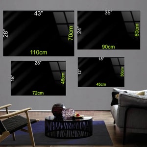 May include: Four black framed mirrors of different sizes hanging on a gray wall. The mirrors are 43 inches by 70 centimeters, 35 inches by 60 centimeters, 28 inches by 46 centimeters, and 18 inches by 30 centimeters.