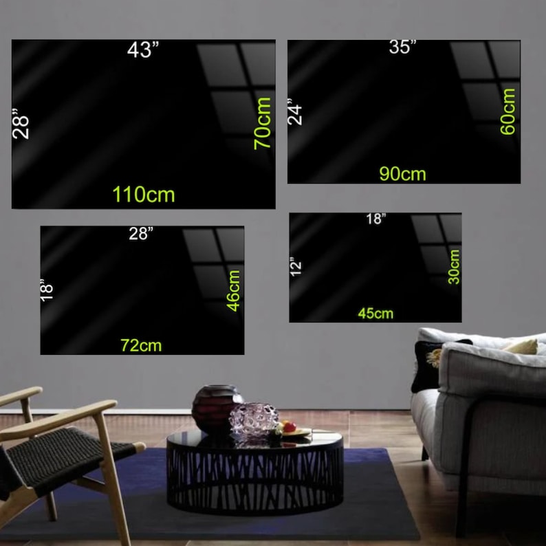 May include: Four black framed mirrors of different sizes hanging on a gray wall. The mirrors are 43 inches by 70 centimeters, 35 inches by 60 centimeters, 28 inches by 46 centimeters, and 18 inches by 30 centimeters.