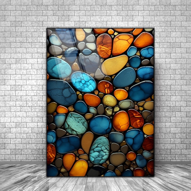 May include: Abstract art print featuring a mosaic of colorful, rounded shapes resembling stones. The colors are predominantly blue, green, and orange.