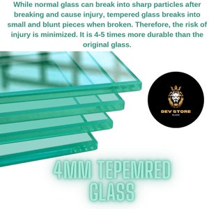 May include: Close-up of four pieces of 4mm tempered glass stacked on top of each other. The glass is clear and has a slight green tint. The text "4MM TEMPERED GLASS" is written in white letters on a black background below the glass.