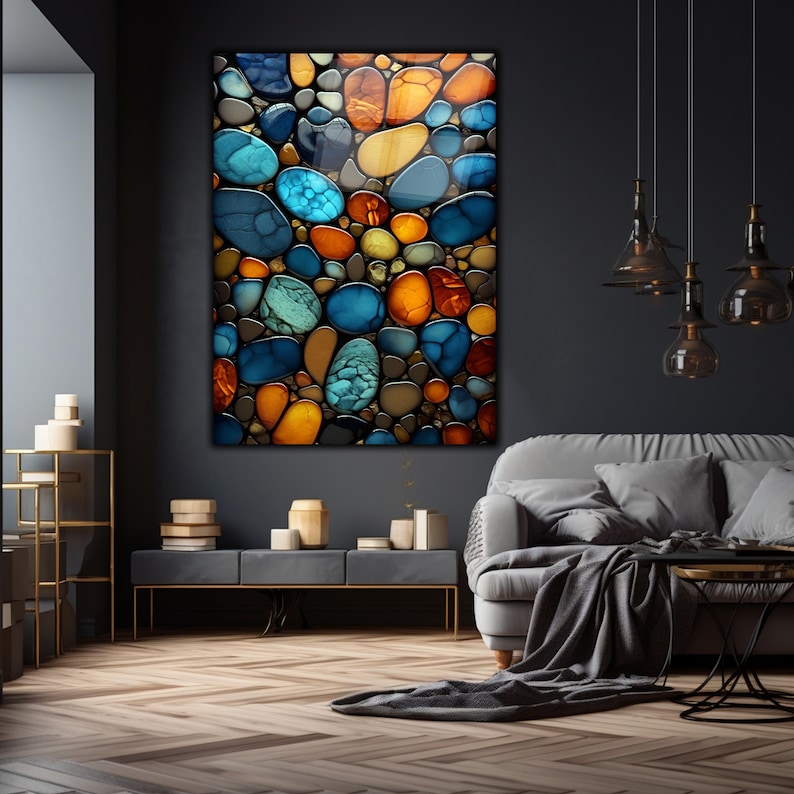 May include: Abstract art print featuring a close-up of colorful, smooth, round stones in shades of blue, green, orange, and brown.