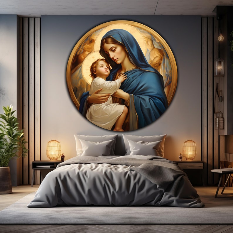 May include: A round painting of the Virgin Mary holding a baby Jesus. The painting is in a gold frame and has a blue and gold background.