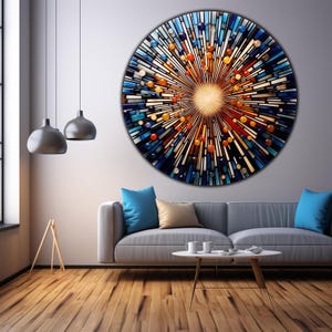 May include: A large circular wall art piece with a burst of colorful glass tiles in shades of blue, orange, and yellow. The tiles are arranged in a radial pattern, creating a sense of movement and energy.