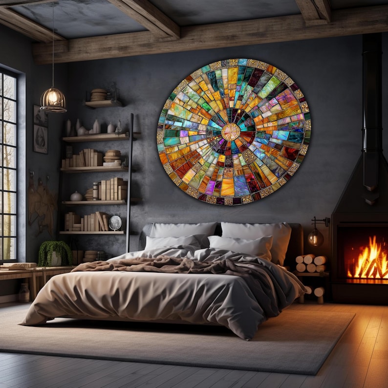 May include: A large, circular wall art piece made of colorful glass tiles. The tiles are arranged in a radial pattern, creating a sunburst effect. The artwork is mounted on a dark gray wall in a bedroom setting.