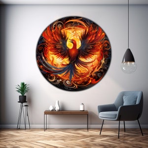 May include: A circular wall art piece featuring a fiery phoenix with outstretched wings against a swirling background of orange, red, and black.