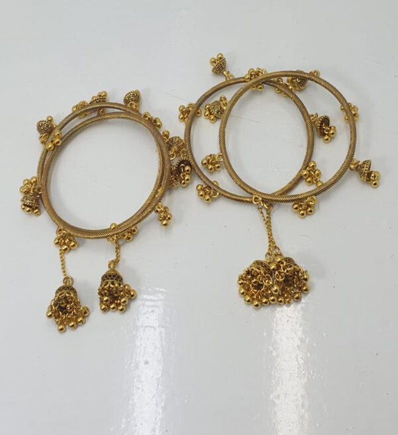 Traditional Golden Bangles – Elegant Handcrafted Jewelry | Pack of Four ...