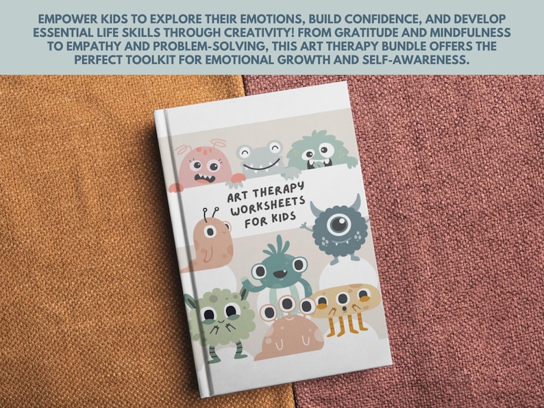 May include: A white book with a colorful cover featuring cartoon monsters. The book title is "Art Therapy Worksheets for Kids".