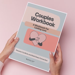 May include: A blue and pink couples workbook with the title "Couples Workbook" and the subtitle "A Workbook For Lasting Love". The cover features a heart with two hands holding it. The text "Resolve Conflicts and Build Deep Connection" is at the bottom of the cover.