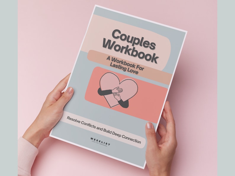 May include: A blue and pink couples workbook with the title "Couples Workbook" and the subtitle "A Workbook For Lasting Love". The cover features a heart with two hands holding it. The text "Resolve Conflicts and Build Deep Connection" is at the bottom of the cover.