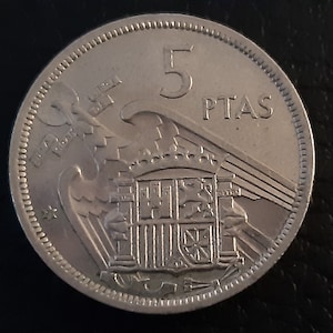 5 Pesetas 1957* 73 Francisco Franco Circulated