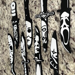 Free Vector  Collection of decoration weapon for games. set of silver  cartoon knives.