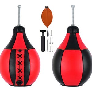 May include: Two red and black speed bags with a metal swivel attachment at the top. One bag features black lace-up detailing. Included are an orange inflatable bladder, a black hand pump, and a set of metal inflation needles and valve adapters.