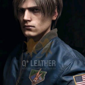 May include: A dark blue bomber jacket featuring a ribbed collar, a front zipper, and a patch on the chest with an eagle graphic and the text UNITED STATES. A United States flag patch is on the sleeve, with the text Q* LEATHER ARTISAN LEATHER STAR QUALITY.